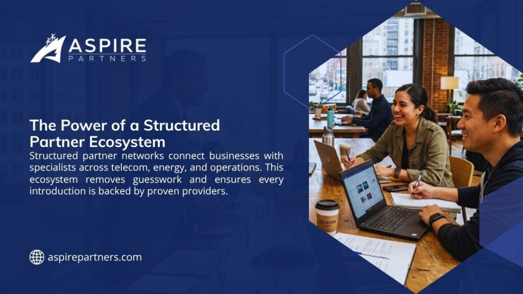 Two professionals collaborating on laptops in a modern workspace, representing the power of a structured partner ecosystem connecting businesses with proven specialists