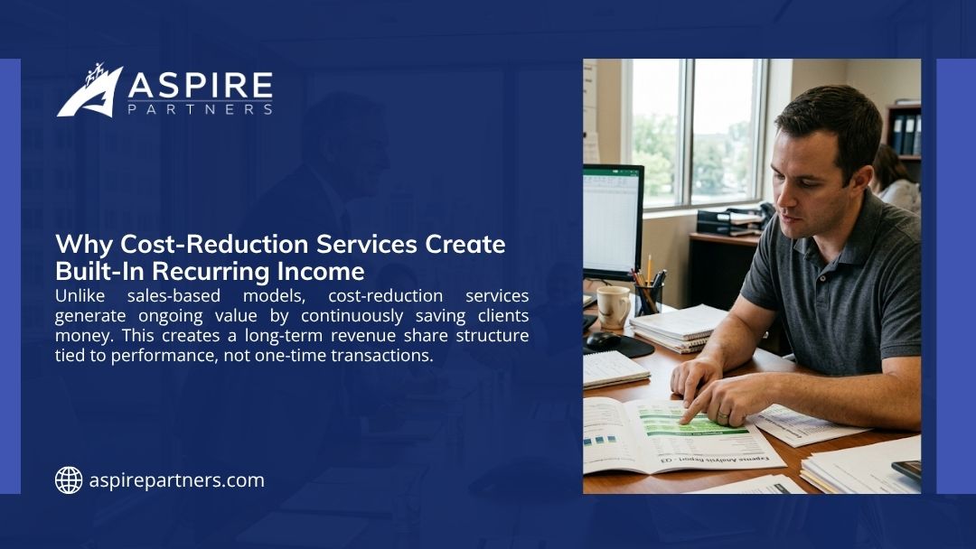 Man analyzing expense reports at his desk, showing how cost-reduction services create built-in recurring income through performance-based revenue sharing.