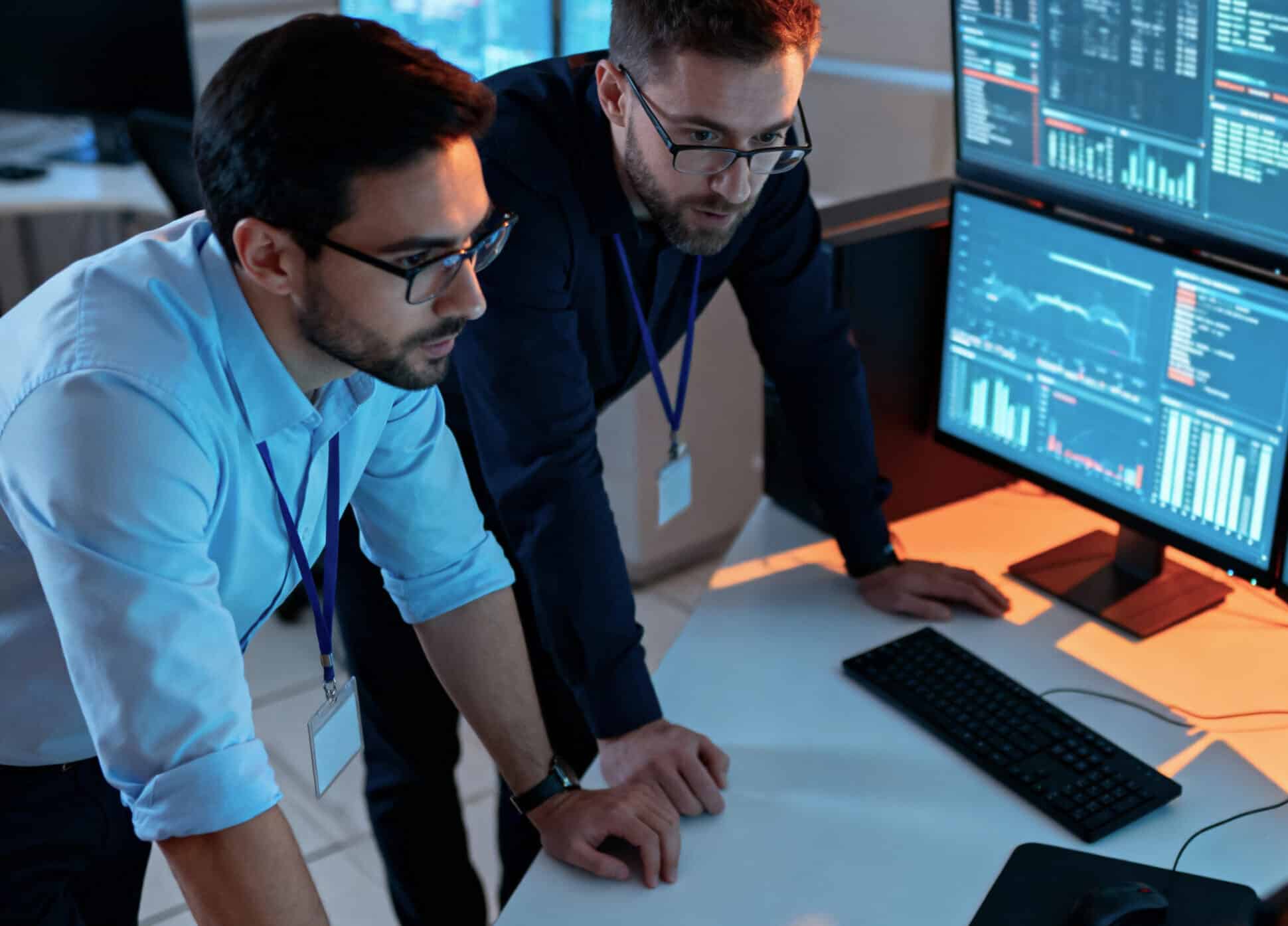 Professionals analyzing real time data